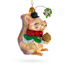 Load image into Gallery viewer, Squirrel Cradling an Acorn Glass Christmas Ornament