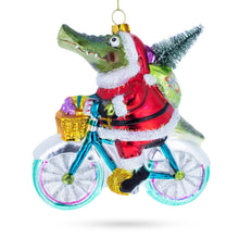Load image into Gallery viewer, Alligator Riding Bicycle with Gifts Glass Christmas Ornament