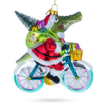 Load image into Gallery viewer, Alligator Riding Bicycle with Gifts Glass Christmas Ornament