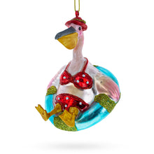 Load image into Gallery viewer, Pelican on Inflatable Ring Glass Christmas Ornament