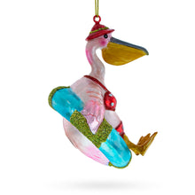 Load image into Gallery viewer, Pelican on Inflatable Ring Glass Christmas Ornament