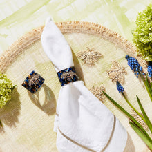 Load image into Gallery viewer, Stripey bee resin napkin rings, blue tortoiseshell, set of four