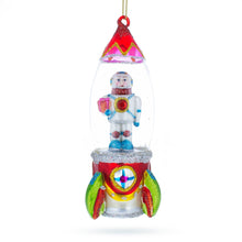 Load image into Gallery viewer, Trailblazing Astronaut Inside Spaceship Glass Christmas Ornament
