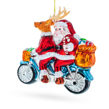 Load image into Gallery viewer, Santa and Reindeer Riding a Tandem Bike Glass Christmas Ornament