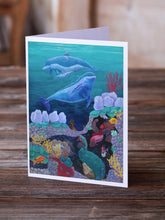 Load image into Gallery viewer, Dolphin Familty Swimming Greeting Cards -  Blank Note Cards – 8-Pack of Artist-Designed Cards with Envelopes