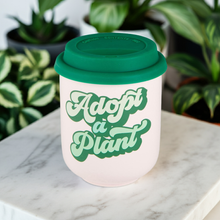 Load image into Gallery viewer, Adopt a Plant Ceramic To Go Mug | Holds 16 oz. | Eco Mug with Silicone Lid and Sleeve