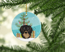 Load image into Gallery viewer, Christmas Tree and Longhair Black and Tan Dachshund Ornament - Round Ceramic Ornament – Artist-Designed Keepsake Decoration BB1585CO1
