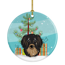 Load image into Gallery viewer, Christmas Tree and Longhair Black and Tan Dachshund Ornament - Round Ceramic Ornament – Artist-Designed Keepsake Decoration BB1585CO1