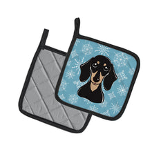 Load image into Gallery viewer, Snowflake Smooth Black and Tan Dachshund Pot Holders - Set of 2 - Heat-Resistant Kitchen Essentials BB1649PTHD