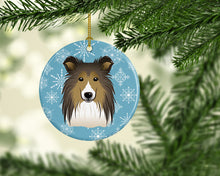 Load image into Gallery viewer, Snowflake Sheltie Ornament - Round Ceramic Ornament – Artist-Designed Keepsake Decoration BB1676CO1