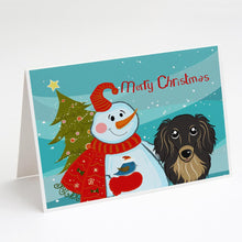 Load image into Gallery viewer, Snowman with Longhair Black and Tan Dachshund Greeting Cards -  Blank Note Cards – 8-Pack of Artist-Designed Cards with Envelopes