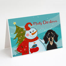 Load image into Gallery viewer, Snowman with Smooth Black and Tan Dachshund Greeting Cards -  Blank Note Cards – 8-Pack of Artist-Designed Cards with Envelopes