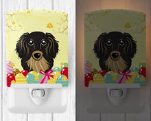 Load image into Gallery viewer, Longhair Black and Tan Dachshund Easter Egg Hunt Ceramic Night Light BB1895CNL