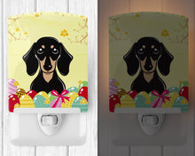 Load image into Gallery viewer, Smooth Black and Tan Dachshund Easter Egg Hunt Ceramic Night Light BB1897CNL