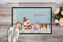 Load image into Gallery viewer, Merry Christmas Carolers Cavalier Spaniel Doormat - 24x36 Decorative Floor Mat – Indoor/Outdoor Rug with Artistic Flair BB2389JMAT