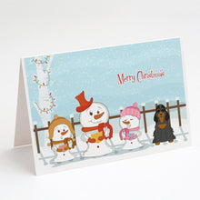 Load image into Gallery viewer, Merry Christmas Carolers Cocker Spaniel Black Tan Greeting Cards -  Blank Note Cards – 8-Pack of Artist-Designed Cards with Envelopes