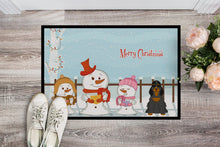 Load image into Gallery viewer, Merry Christmas Carolers Cocker Spaniel Black Tan Doormat - 24x36 Decorative Floor Mat – Indoor/Outdoor Rug with Artistic Flair BB2424JMAT