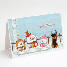 Load image into Gallery viewer, Merry Christmas Carolers English Toy Terrier Greeting Cards -  Blank Note Cards – 8-Pack of Artist-Designed Cards with Envelopes