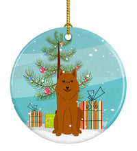 Load image into Gallery viewer, Merry Christmas Tree Karelian Bear Dog Ornament - Round Ceramic Ornament – Artist-Designed Keepsake Decoration BB4147CO1