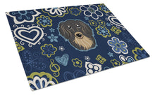 Load image into Gallery viewer, Blue Flowers Longhair Black and Tan Dachshund Glass Cutting Boards – Durable, Decorative Kitchen Art Large BB5064LCB