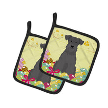 Load image into Gallery viewer, Easter Eggs Miniature Schanuzer Black Pot Holders - Set of 2 - Heat-Resistant Kitchen Essentials BB6051PTHD