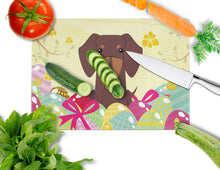 Load image into Gallery viewer, Easter Eggs Dachshund Chocolate Glass Cutting Boards – Durable, Decorative Kitchen Art Large BB6131LCB