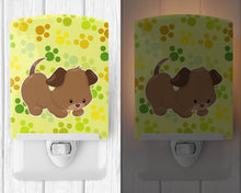 Load image into Gallery viewer, Puppy on Green Pawprints Ceramic Night Light BB7078CNL