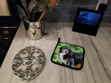Load image into Gallery viewer, Bernese Mountain Dog St Patrick's Pot Holders - Set of 2 - Heat-Resistant Kitchen Essentials BB9819PTHD