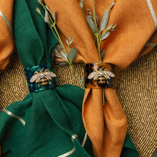 Load image into Gallery viewer, Stripey bee resin napkin rings, tortoiseshell, set of four