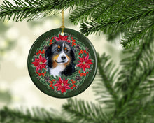 Load image into Gallery viewer, Bernese Mountain Dog Poinsetta Wreath Ornament - Round Ceramic Ornament – Artist-Designed Keepsake Decoration