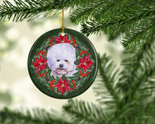 Load image into Gallery viewer, Bichon Frise Poinsetta Wreath Ornament - Round Ceramic Ornament – Artist-Designed Keepsake Decoration