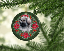 Load image into Gallery viewer, Moscow Watchdog Poinsetta Wreath Ornament - Round Ceramic Ornament – Artist-Designed Keepsake Decoration