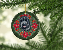 Load image into Gallery viewer, Black Russian Terrier Poinsetta Wreath Ornament - Round Ceramic Ornament – Artist-Designed Keepsake Decoration