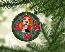 Load image into Gallery viewer, Basset Hound Poinsetta Wreath Ornament - Round Ceramic Ornament – Artist-Designed Keepsake Decoration