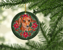 Load image into Gallery viewer, Red Dachshund Poinsetta Wreath Ornament - Round Ceramic Ornament – Artist-Designed Keepsake Decoration