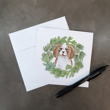 Load image into Gallery viewer, Cavalier King Charles Spaniel Blenheim Puppy Smiling with Christmas Wreath Square Greeting Cards -  Blank Note Cards – 8-Pack of Artist-Designed Cards with Envelopes