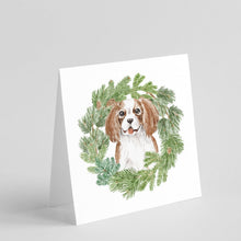 Load image into Gallery viewer, Cavalier King Charles Spaniel Blenheim Puppy Smiling with Christmas Wreath Square Greeting Cards -  Blank Note Cards – 8-Pack of Artist-Designed Cards with Envelopes