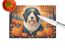 Load image into Gallery viewer, Bearded Collie Fall Glass Cutting Boards – Durable, Decorative Kitchen Art Large