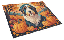 Load image into Gallery viewer, Bearded Collie Fall Glass Cutting Boards – Durable, Decorative Kitchen Art Large