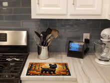 Load image into Gallery viewer, Black Cairn Terrier Fall Glass Cutting Boards – Durable, Decorative Kitchen Art Large