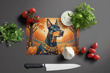 Load image into Gallery viewer, Doberman Pinscher Fall Glass Cutting Boards – Durable, Decorative Kitchen Art Large