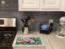 Load image into Gallery viewer, Louisiana Magnolias in Watercolor Glass Cutting Boards – Durable, Decorative Kitchen Art Large