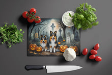 Load image into Gallery viewer, Sheltie Spooky Halloween Glass Cutting Boards – Durable, Decorative Kitchen Art Large