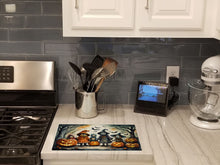 Load image into Gallery viewer, Trick or Treaters Spooky Halloween Glass Cutting Boards – Durable, Decorative Kitchen Art Large