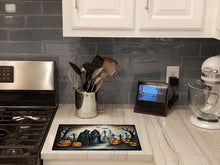 Load image into Gallery viewer, The Grim Reaper Spooky Halloween Glass Cutting Boards – Durable, Decorative Kitchen Art Large