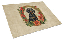 Load image into Gallery viewer, Black and Tan Coonhound Christmas Flowers Glass Cutting Boards – Durable, Decorative Kitchen Art