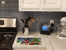 Load image into Gallery viewer, Miniature Pinscher Cozy Christmas Glass Cutting Boards – Durable, Decorative Kitchen Art Large