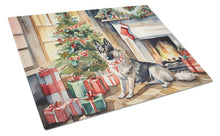 Load image into Gallery viewer, Norwegian Elkhound Cozy Christmas Glass Cutting Boards – Durable, Decorative Kitchen Art Large