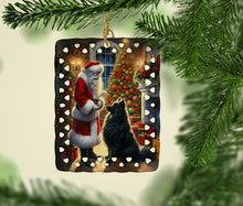 Load image into Gallery viewer, Belgian Sheepdog and Santa Claus Porcelain Ornament