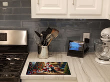 Load image into Gallery viewer, Bernese Mountain Dog and Santa Claus Glass Cutting Boards – Durable, Decorative Kitchen Art
